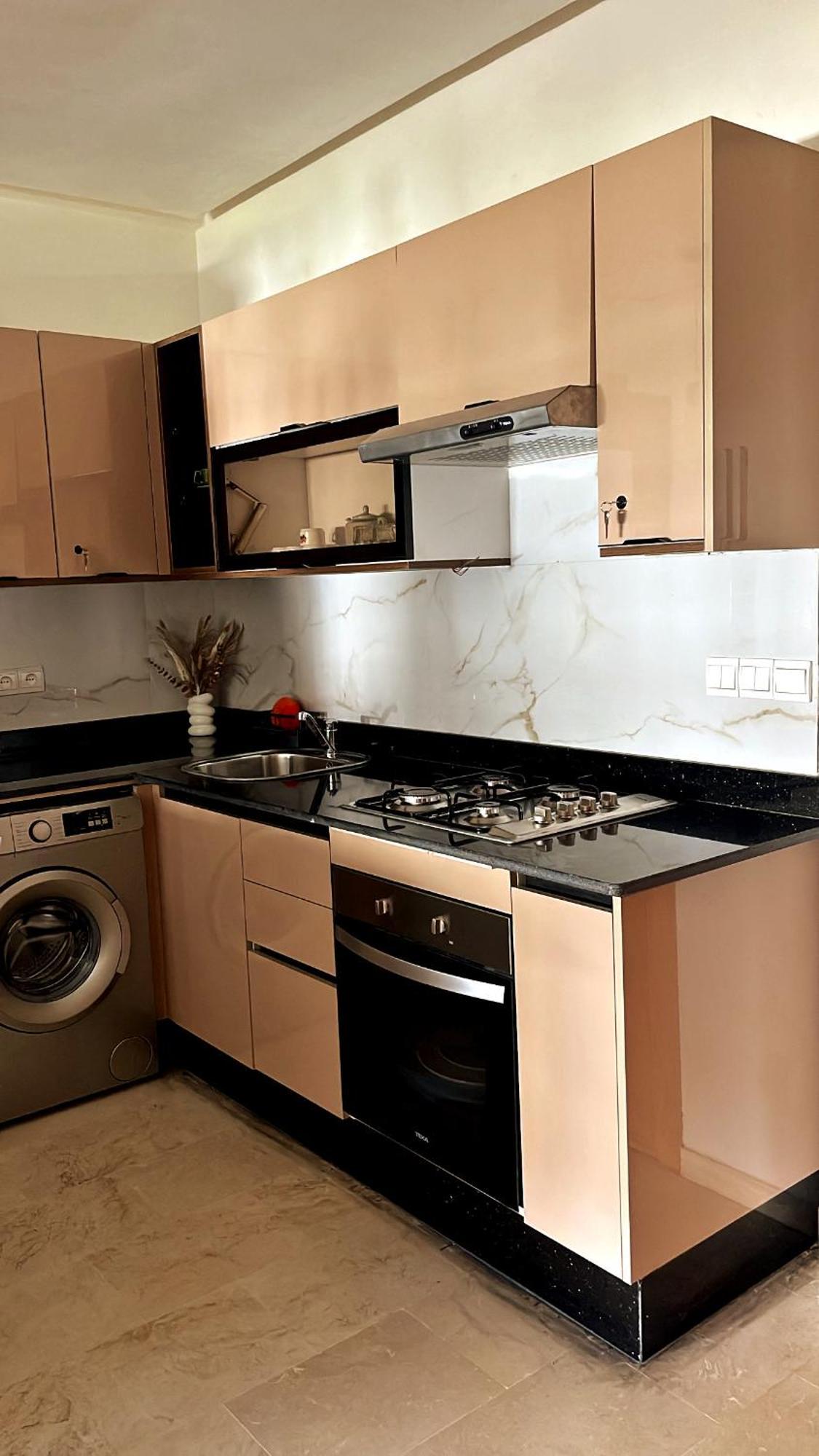 Elegant Appartement Avec Un Acces Piscine Jardin Parking Sous-Sol Et Wifi Haut Debit Fibre Optique طنجة المظهر الخارجي الصورة